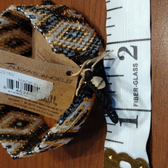 Alexa's Angels pull string Clasp bracelet. - Picture 7 of 9